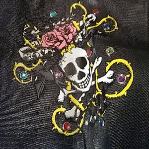 Black skull and jewel flap crossbody bag